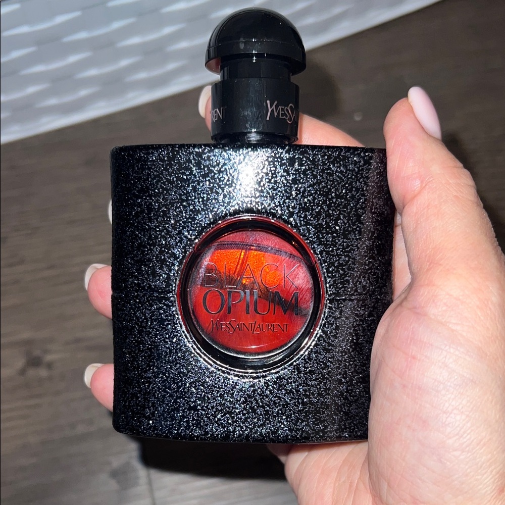 Yves Saint Laurent Black Opium Glitter Bottle with Red Accent